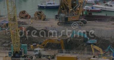 在香港，<strong>中国</strong>正在进行建筑<strong>工程</strong>-挖掘机挖掘地面